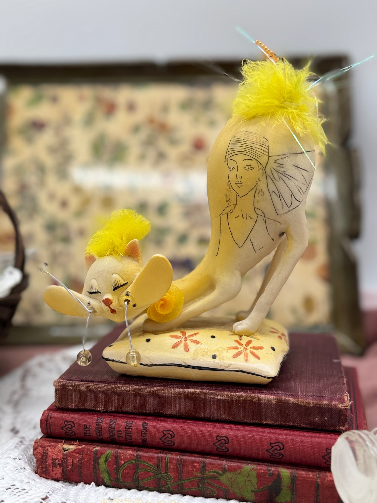 Vintage Yellow Whimsical Resin Cat Figurine Sitting on Pillow with Carved Fashion Portrait