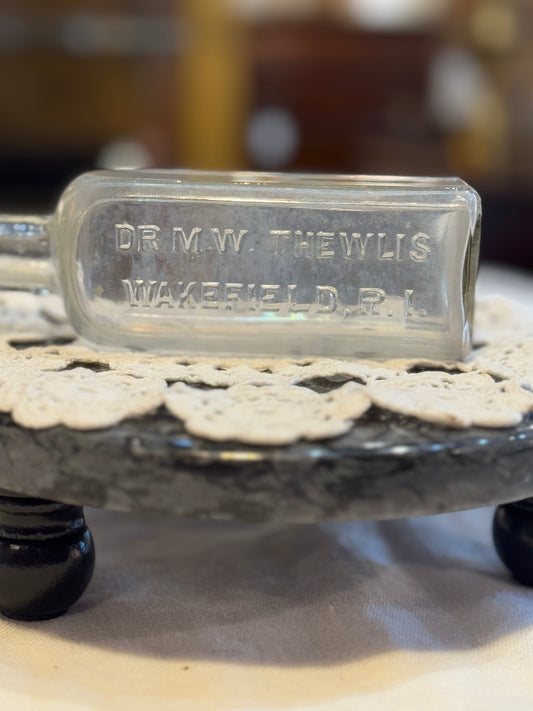 DR M.W. THEWLIS,Wakefield,R.I. - 5" Antique Glass Medicine Bottle