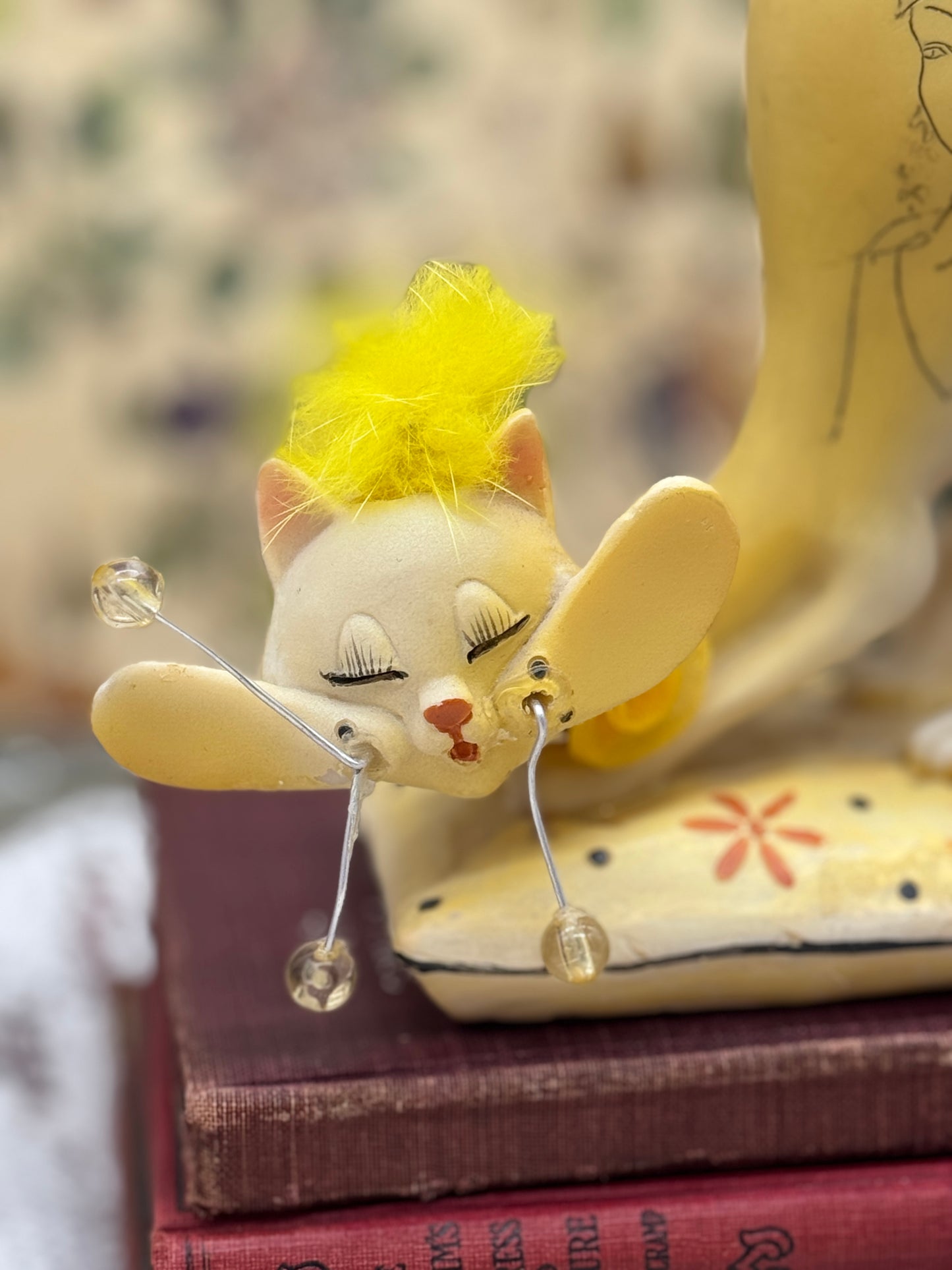 Vintage Yellow Whimsical Resin Cat Figurine Sitting on Pillow with Carved Fashion Portrait