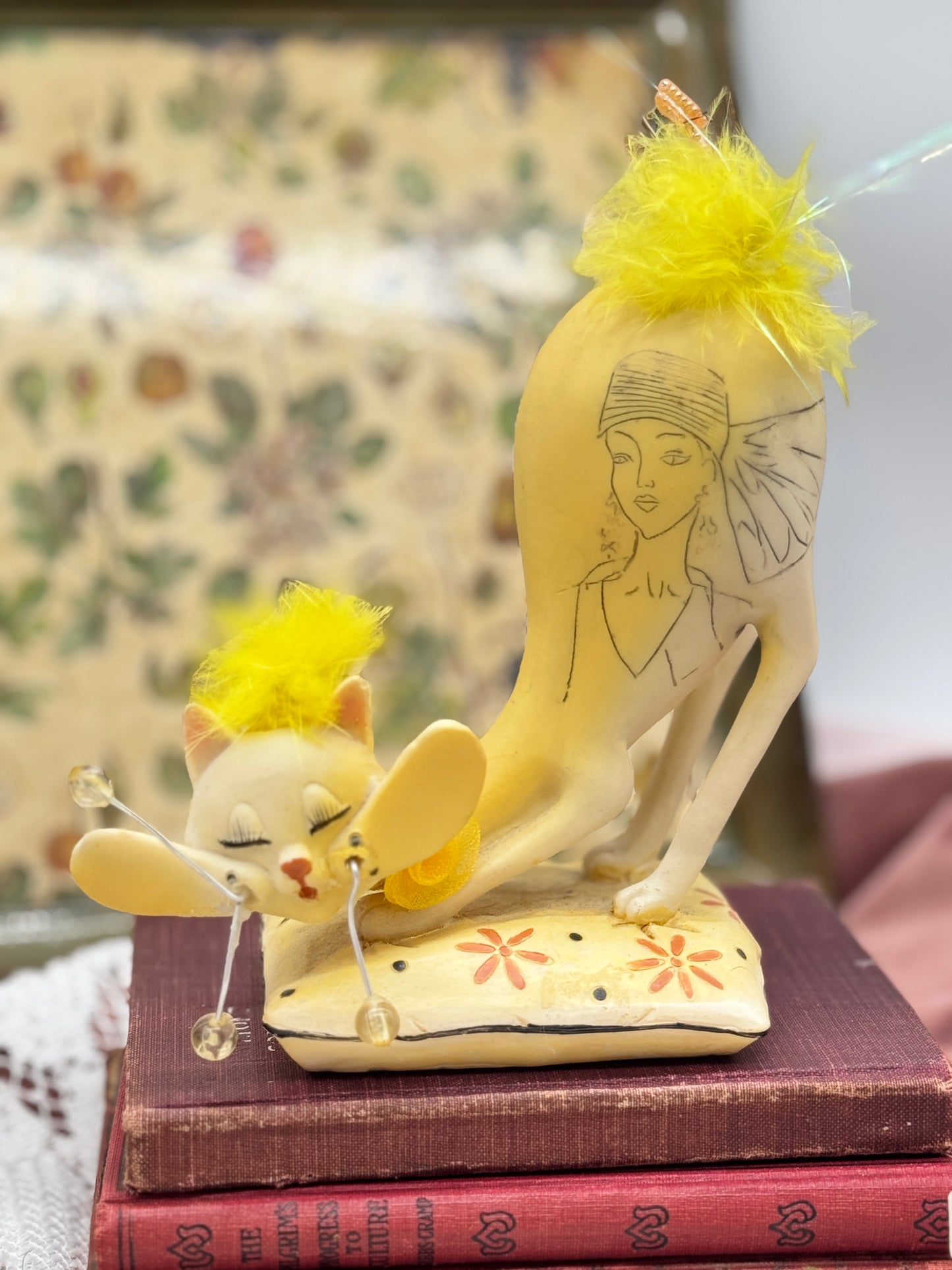 Vintage Yellow Whimsical Resin Cat Figurine Sitting on Pillow with Carved Fashion Portrait
